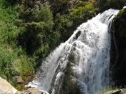 Trekking in Uzbekistan mountains. Aksarsay waterfall.